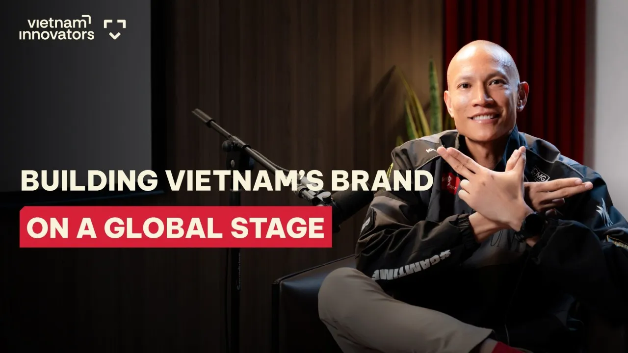 TK Nguyen making the GAM hand sign on the Vietnam Innovators podcast cover: Building Vietnam's brand on a global stage