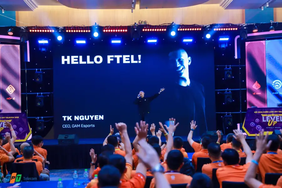 TK Nguyen on stage at an FPT Telecom event