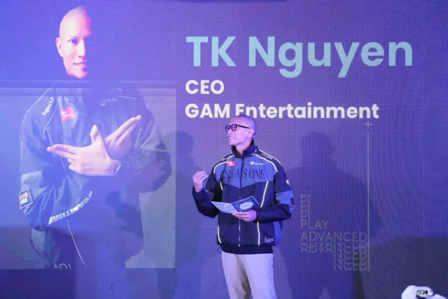TK Nguyen hosting an event on stage