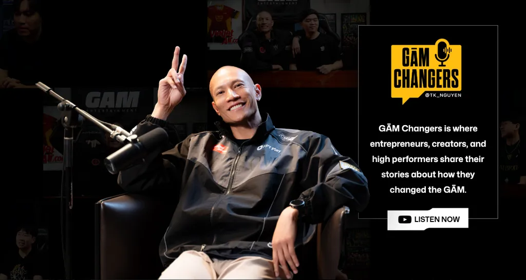 TK Nguyen in the GAM Changers studio beside the show card: GAM Changers is where entrepreneurs, creators and high performers share their stories