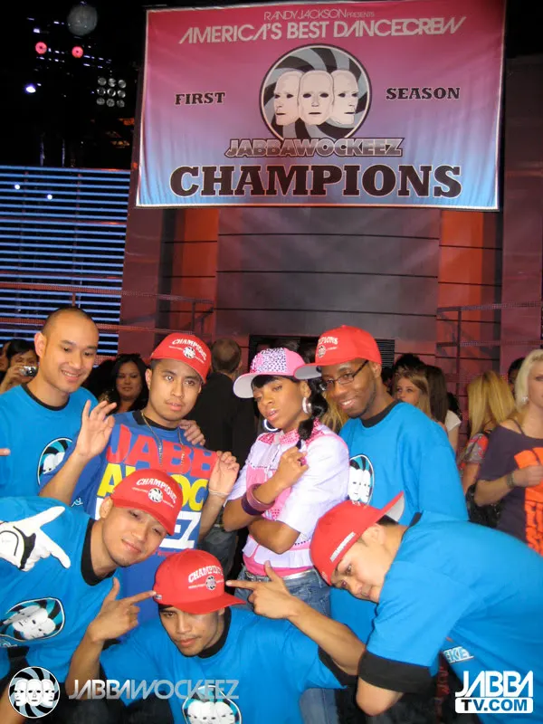 The Jabbawockeez and friends under the America's Best Dance Crew "First Season Champions" banner