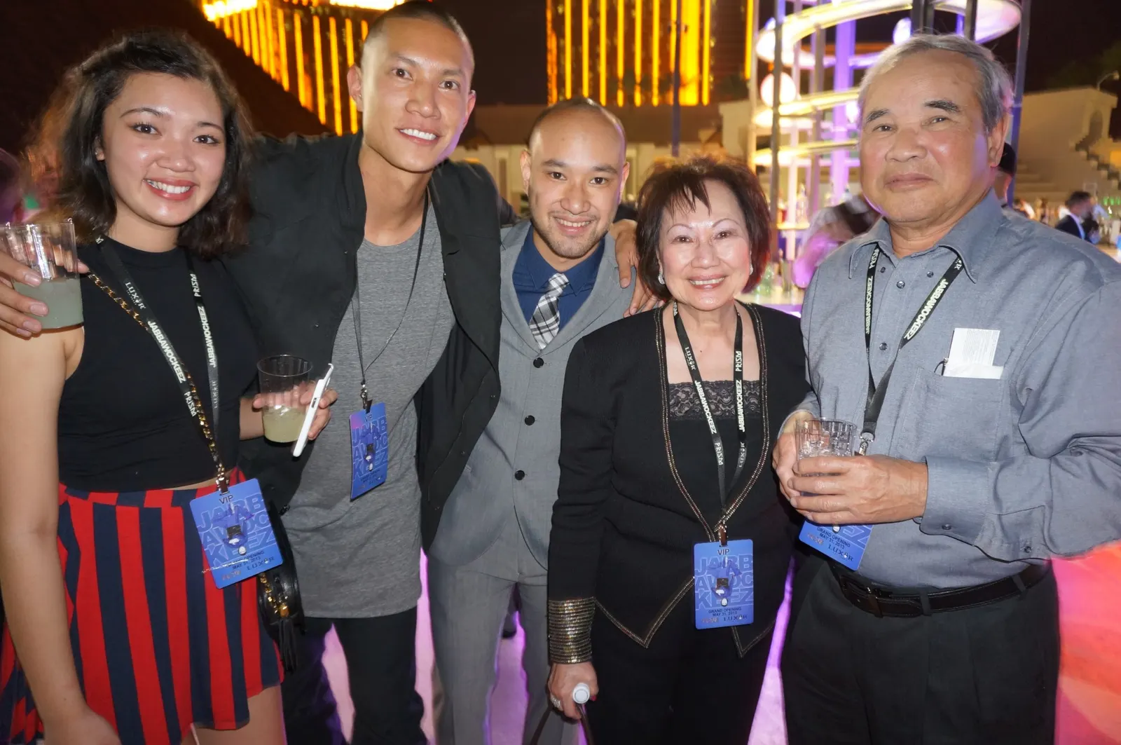 TK Nguyen with his cousin Demi, Jeff "Phi" Nguyen and Phi's parents, all wearing Jabbawockeez VIP passes at the Luxor grand opening